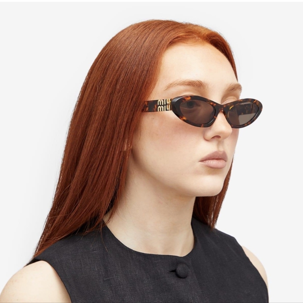 Miu Miu Tortoise Shell Sunglasses